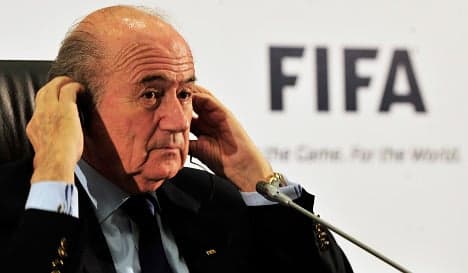 Embattled Blatter vows to see out FIFA term
