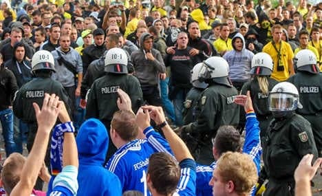 Police arrest 200 football fans after riots