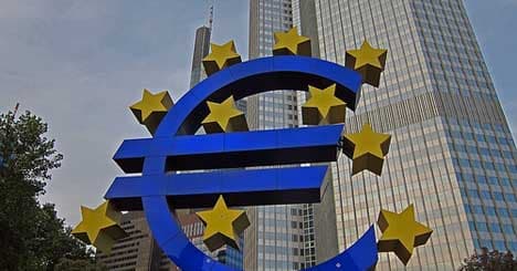 Hollande demands strict rules on EU bank union