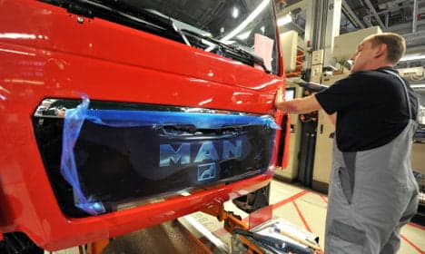 Top German truck maker suspends production