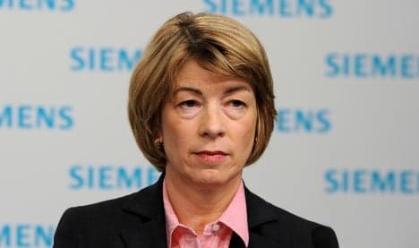 Siemens cuts woman who broke glass ceiling