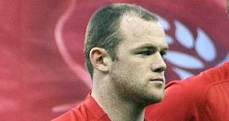 Man United star Rooney serves Swiss penalty