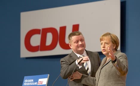 Merkel seeks to rally her conservatives for vote
