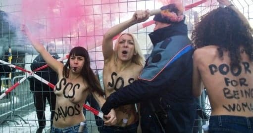 Topless feminists protest against Davos forum