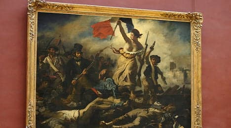 Woman defaces Louvre's iconic Delacroix painting