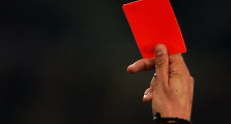 Football ref loses spleen in cop's red card rage