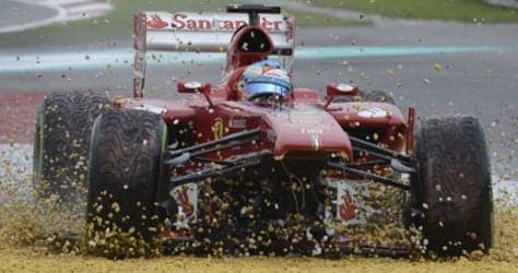 Alonso sees red after 200th GP error