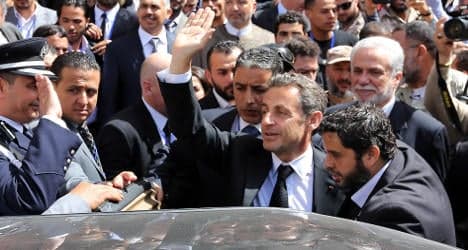 Sarkozy greeted as a hero on return to Libya