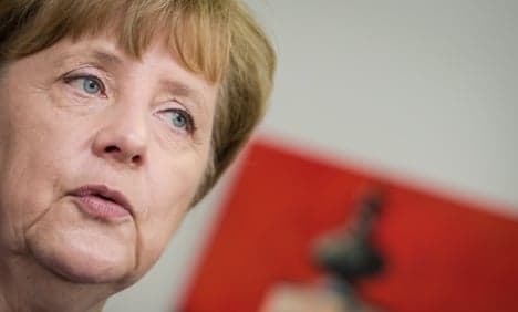 Merkel 'very pleased' with Cyprus bailout deal