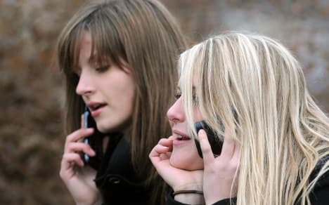 Young Germans happy to answer phone on loo
