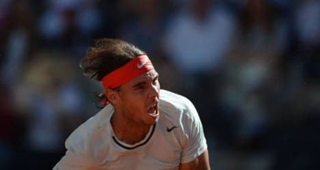 Nadal thrashes Federer in Rome final
