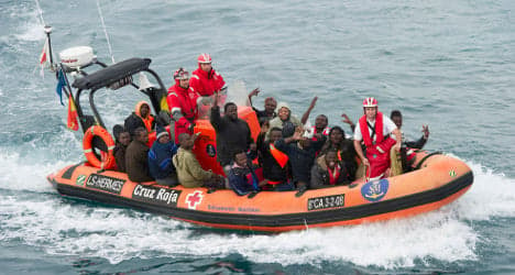 Spain authorities help rescue 66 migrants at sea
