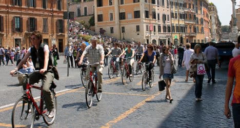 Crisis-hit Italians swap cars for bikes