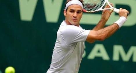 Federer clinches first title of season in Germany