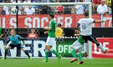 Dempsey scores two as USA down Germany