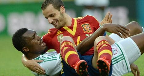 Spain down Nigeria to set up Italy showdown