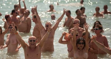 Nude Spaniards smash world 'skinny dip' record