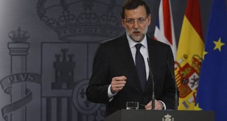 Defiant Spanish PM snubs resignation talk
