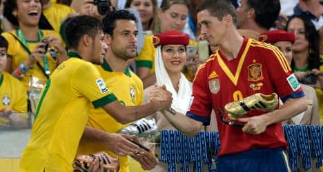 Wounded Spain defiant after Brazil defeat
