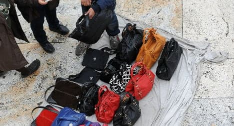 Italian police crack down on fake handbag sellers