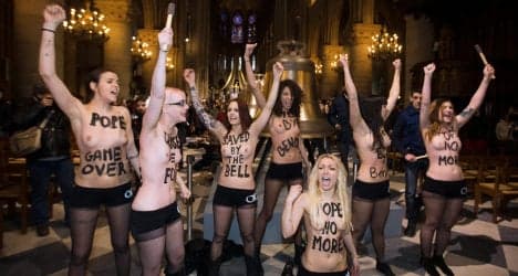 Femen due in court over topless Notre Dame stunt