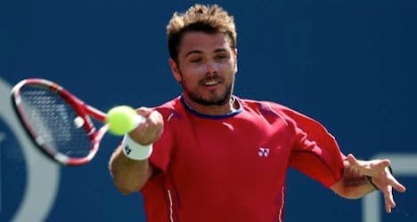 Switzerland advances in Davis Cup tennis play