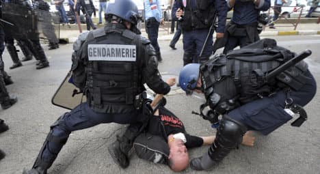 Activists clash with riot police at French bullfight