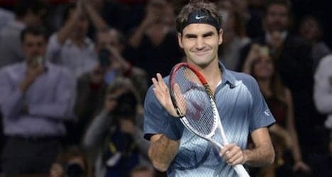 Federer and Wawrinka win first rounds in Paris