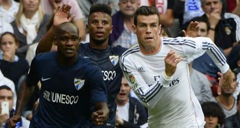 Real Madrid ease past Malaga as Bale returns