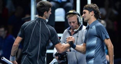Federer loses again to Djokovic at world finals