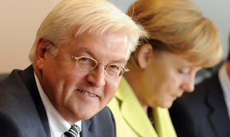 Merkel's ex-foreign minister returns to role