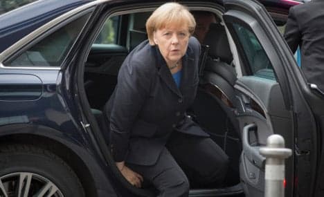 Merkel escapes limo crash unscathed