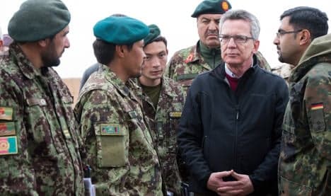 Germany tells Afghan leader to sign NATO pact