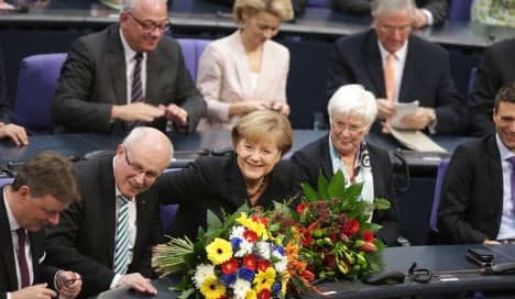 MPs elect Merkel to third term as chancellor