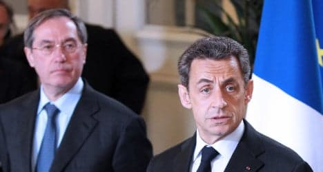 Sarkozy return hopes hit as cops grill two allies