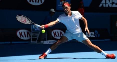 Federer prevails in searing Aussie Open heat