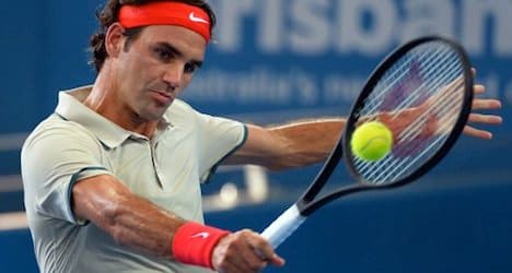 Federer shrugs off Brisbane loss to Hewitt