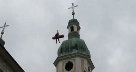 Senior plucked from belfry by helicopter