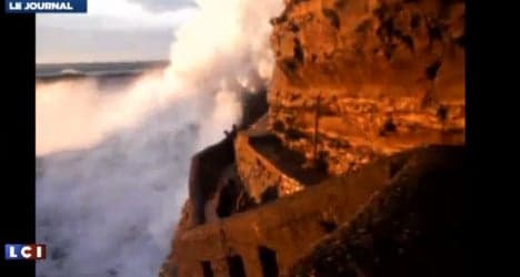 VIDEO: Woman swept out to sea by giant wave