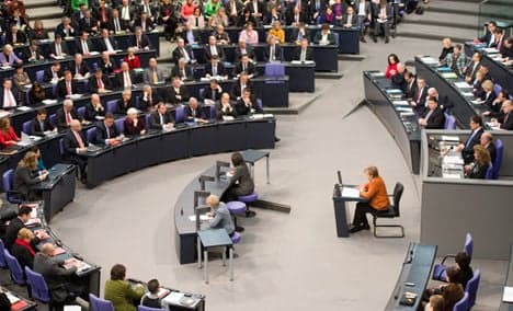 Merkel lays out priorities for next four years
