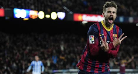 Barça get over boss blues with Malaga win