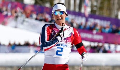 Bjørgen wins new gold in team sprint