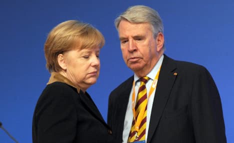 Merkel ally quits over tax scandal