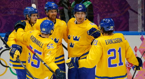Sweden thrash Slovenia in hockey quarter final