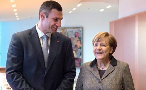 Merkel meets Klitschko, welcomes amnesty