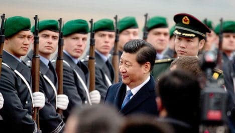 China's President Xi arrives in Germany