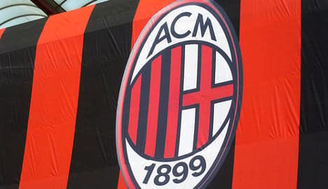 Berlusconi's AC Milan eyes sale: report