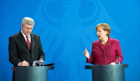 Merkel hopes Russia sanctions are enough