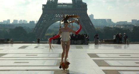 Artist defends Eiffel Tower coq dance in court