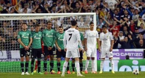 Ronaldo double seals Real's place in last eight